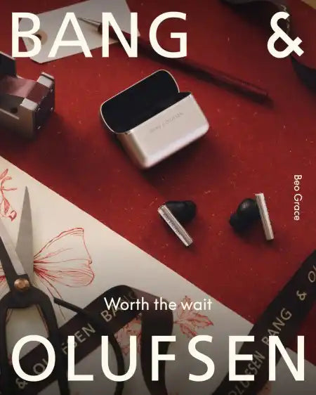 Bang & olufsen wireless earbuds in sleek black and silver, premium design with a minimalist aesthetic.