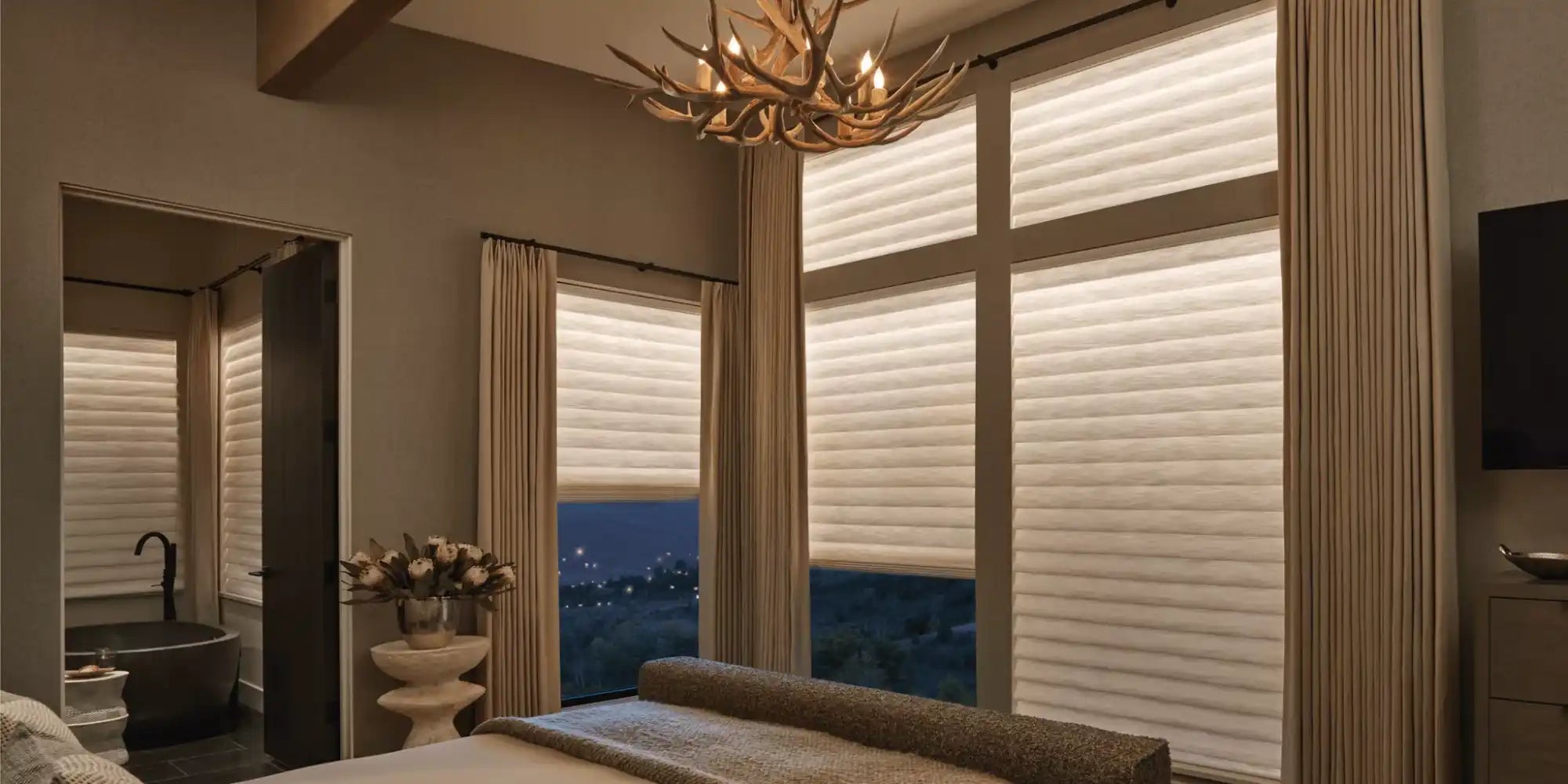 Luxurious bedroom with window treatments.