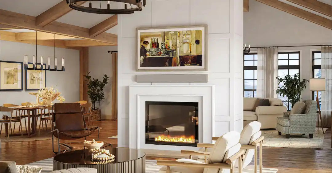Modern living room with a large, framed television above a fireplace.