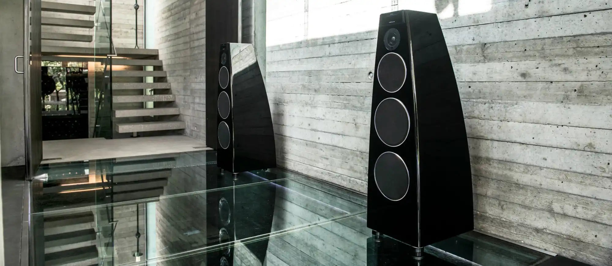 Pair of black tower speakers.