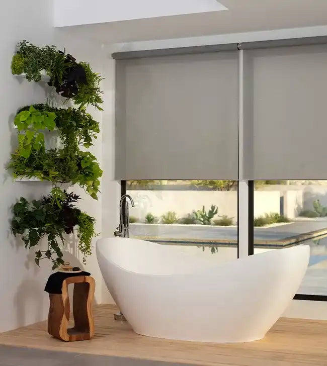 Freestanding white bathtub.