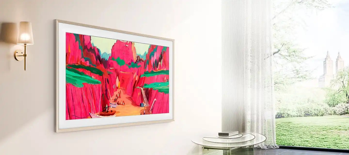 A wall-mounted television displaying a colorful abstract landscape painting.